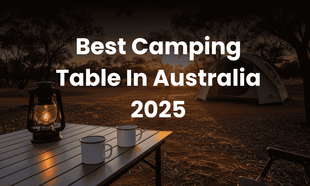A camping table set with a lantern and mugs at a campsite in the Australian bush during a beautiful sunset