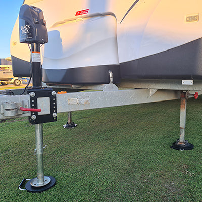 Black Jack Electric RV Caravan Trailer Jack in use
